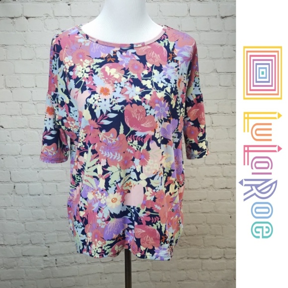 LuLaRoe Tops - 🔥SALE🔥 LULAROE Floral Navy Hi Lo Irma Shirt